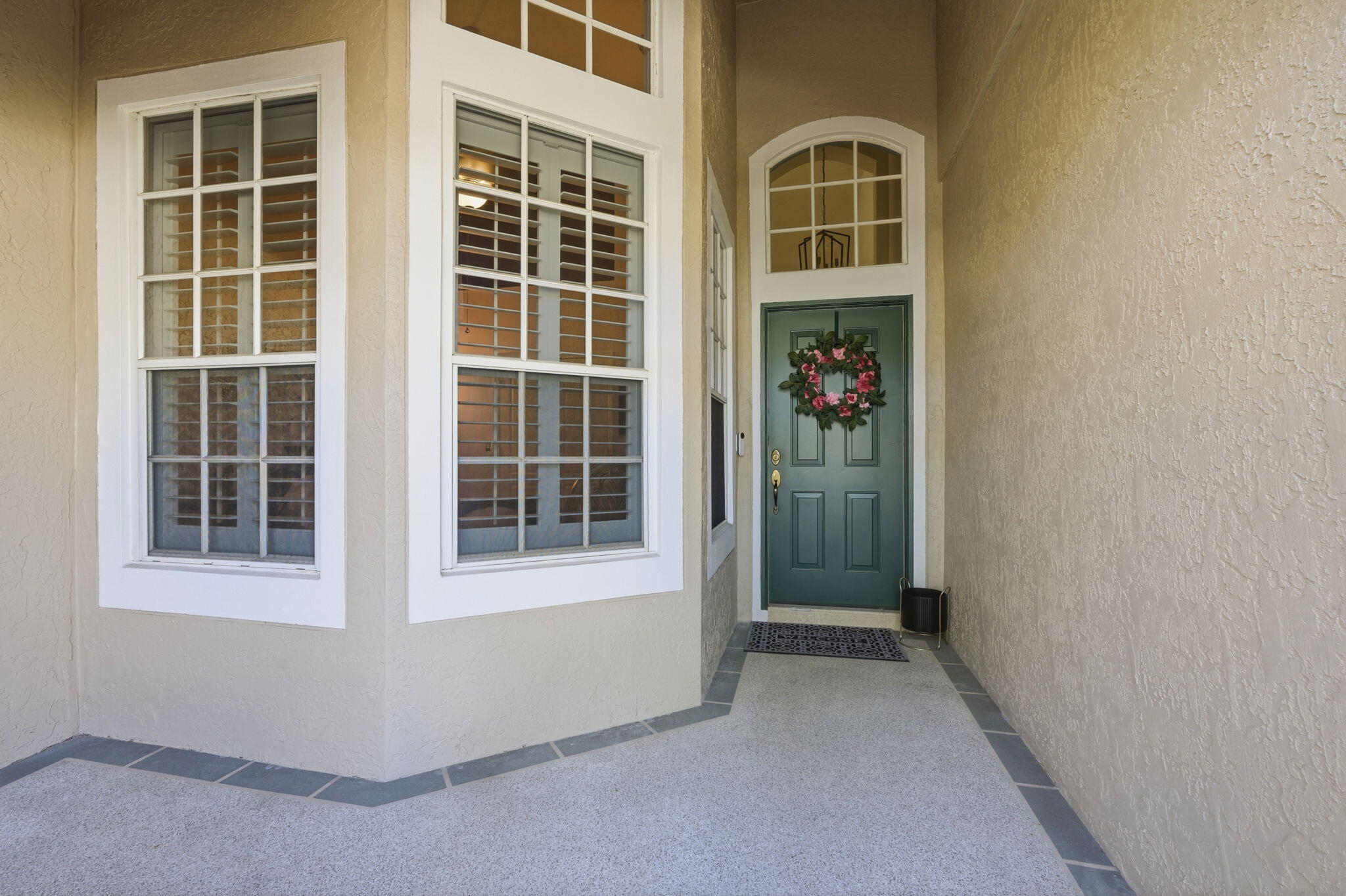 1632 Southwest Harbour Isles Circle, Unit 88 Port St. Lucie, FL 34986 - Photo 4 of 36 a view of front door of a house