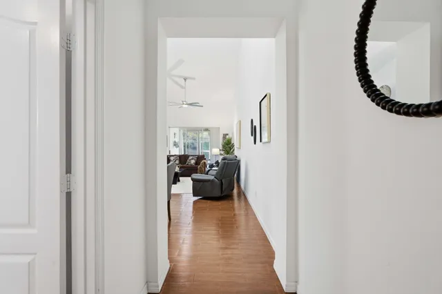 a view of a bedroom from a corridor