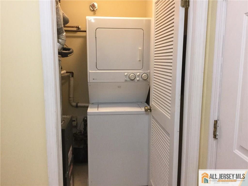 2803 Ridgefield Court Helmetta, NJ 08828 - Photo 15 of 20 a utility room with dryer and washer