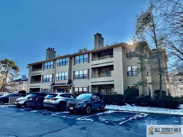 2803 Ridgefield Court Helmetta, NJ 08828 - Photo 19 of 20 a front view of a building with outdoor seating