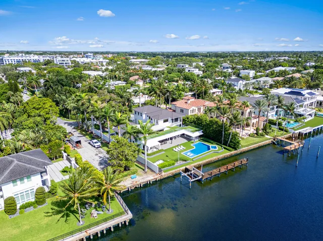 an aerial view of a house with a garden and plants