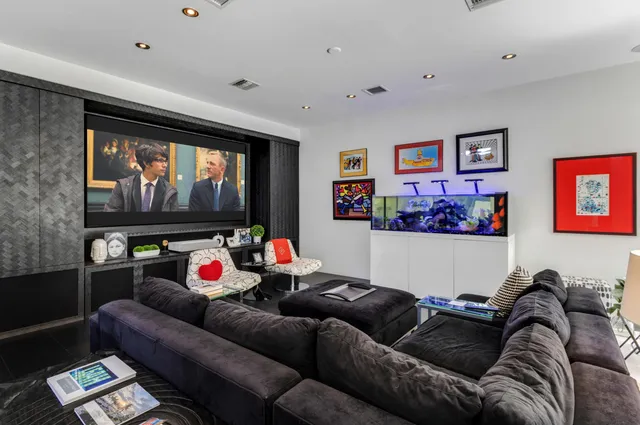 a spacious bathroom with a glass shower door and a bathtub