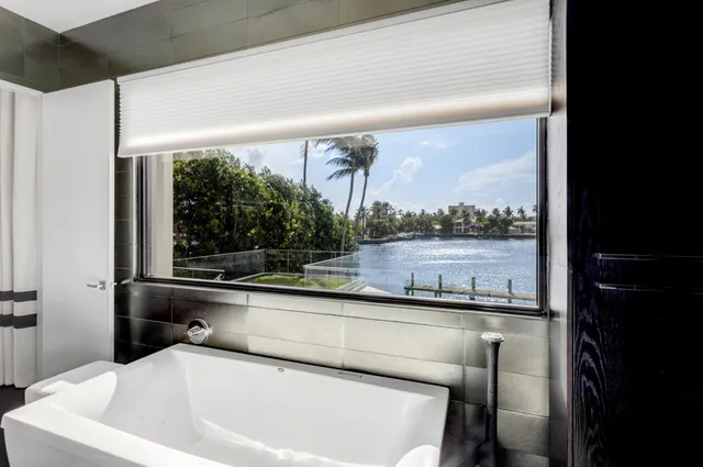 a picture of a wall with a white building