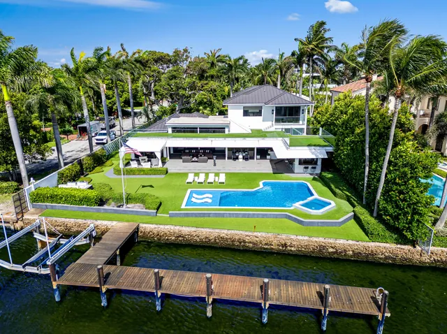 a view of a swimming pool with a lounge chairs