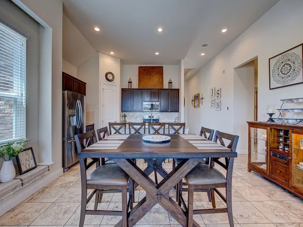 a view of a dining room with furniture