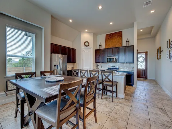 a view of a dining room with furniture