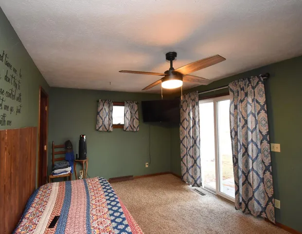 a view of entryway with stairs and wooden floor