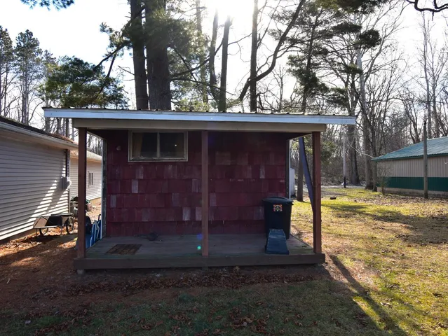a backyard of a house with lots of green space