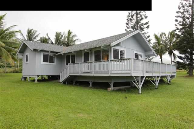 215 Maia Road Hana, HI 96713 - Photo 19 of 23 a backyard of a house with table and chairs
