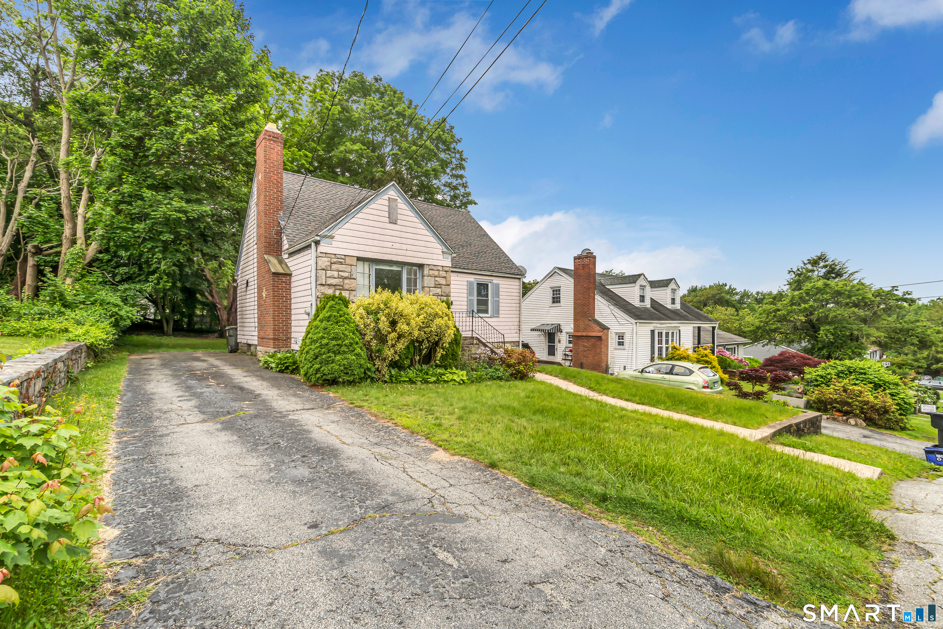 214 Thames Street New London, CT 06320 - Photo 1 of 33 a front view of a house with a yard