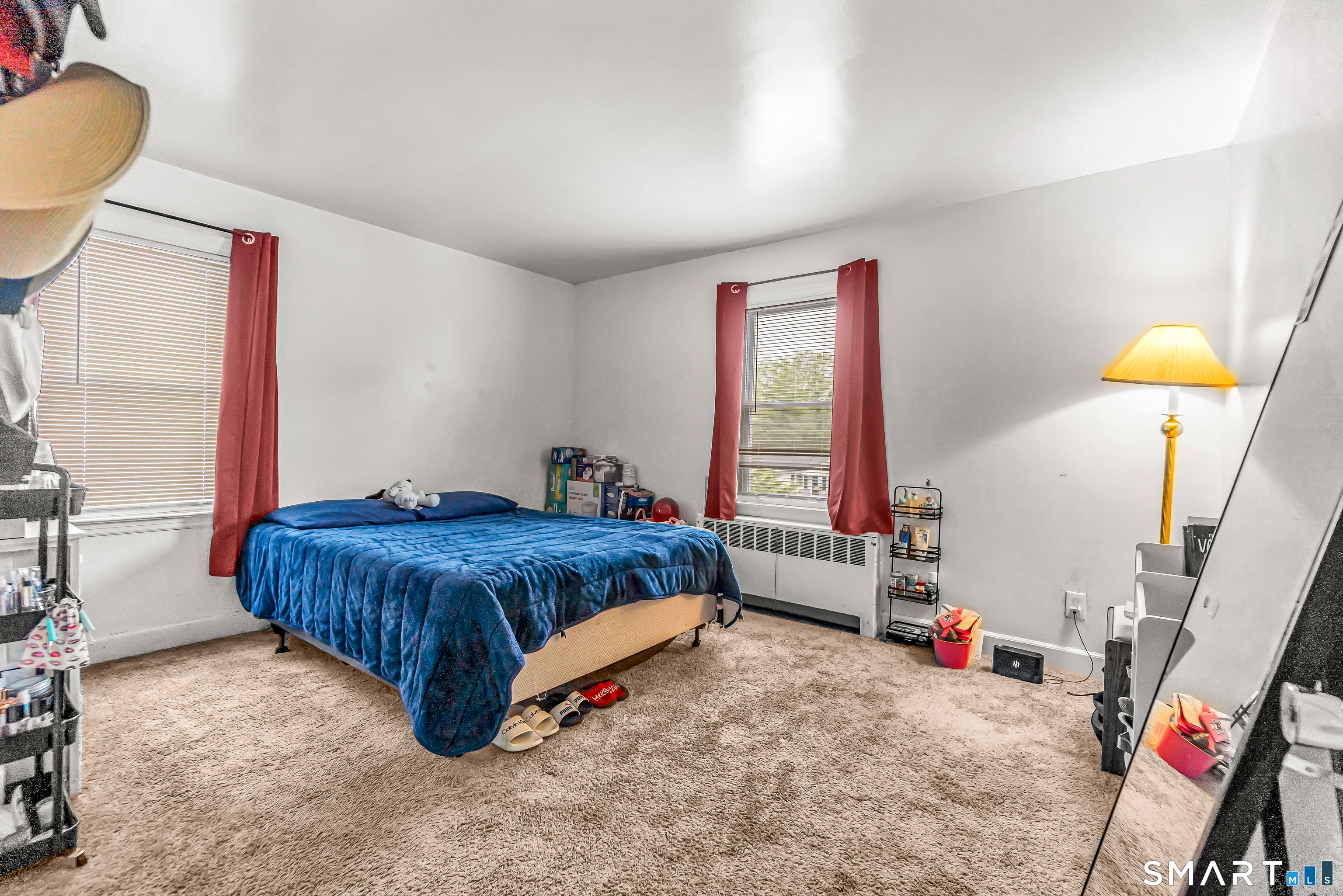 214 Thames Street New London, CT 06320 - Photo 20 of 33 a bedroom with a bed and a window