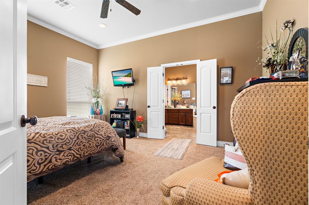 845 County Line Road West West, TX 76691 - Photo 13 of 38 a bedroom with a bed and a couch