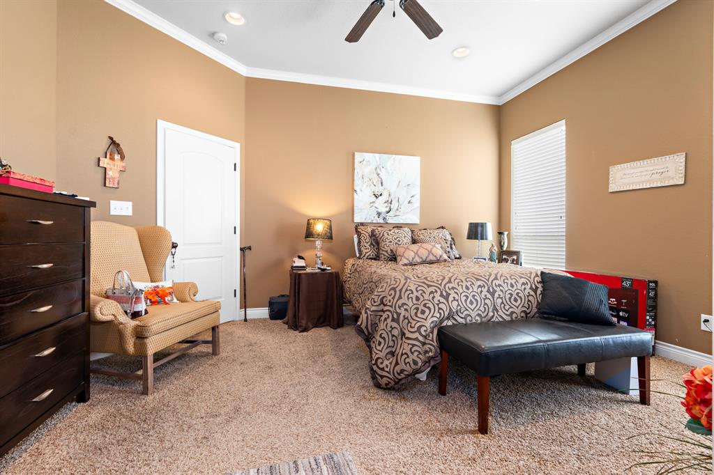 845 County Line Road West West, TX 76691 - Photo 14 of 38 a bedroom with furniture and wooden floor