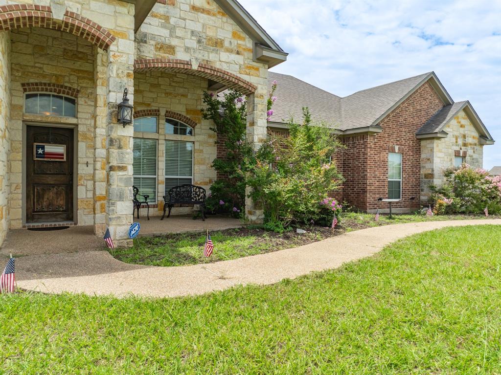 845 County Line Road West West, TX 76691 - Photo 18 of 38 a front view of a house with a yard and porch
