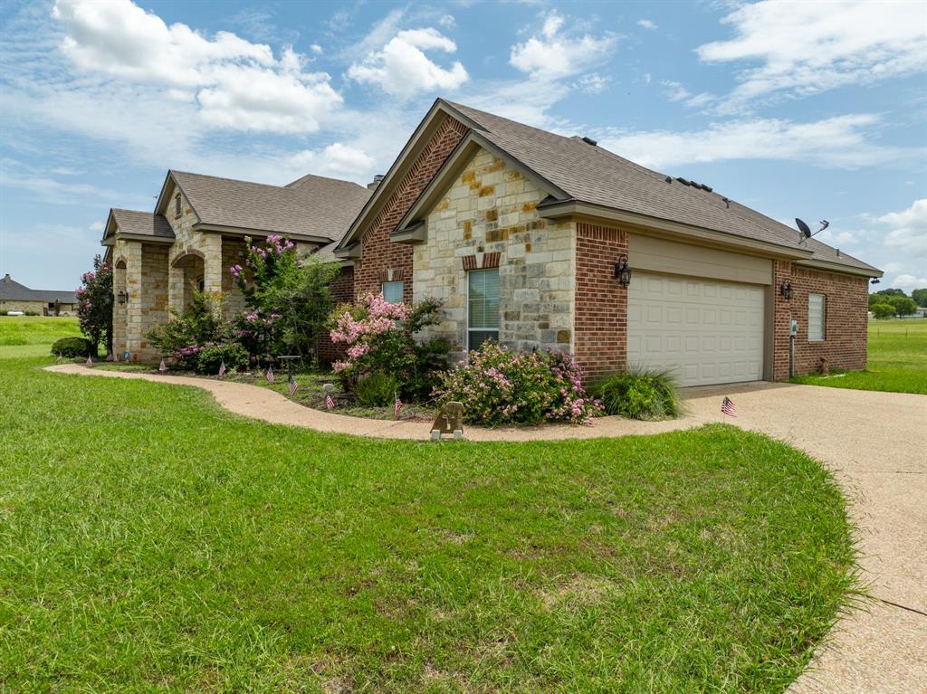 845 County Line Road West West, TX 76691 - Photo 19 of 38 a front view of house with yard and green space