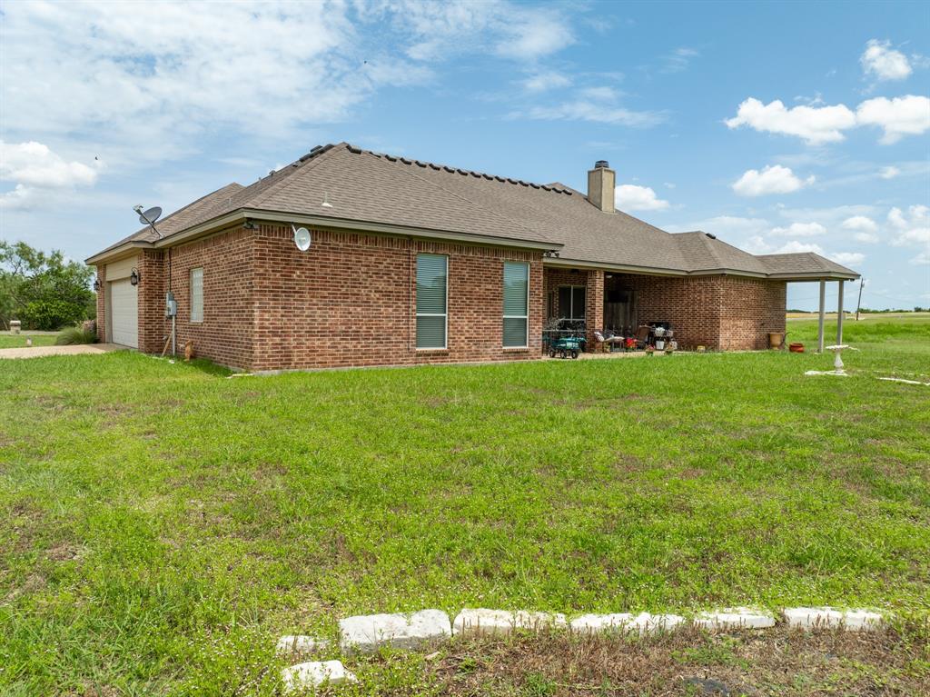 845 County Line Road West West, TX 76691 - Photo 23 of 38 a front view of a house with a yard