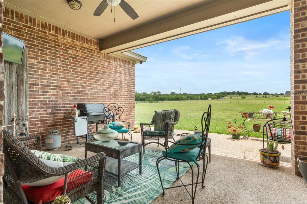 845 County Line Road West West, TX 76691 - Photo 24 of 38 a view of a terrace with furniture and a ocean view