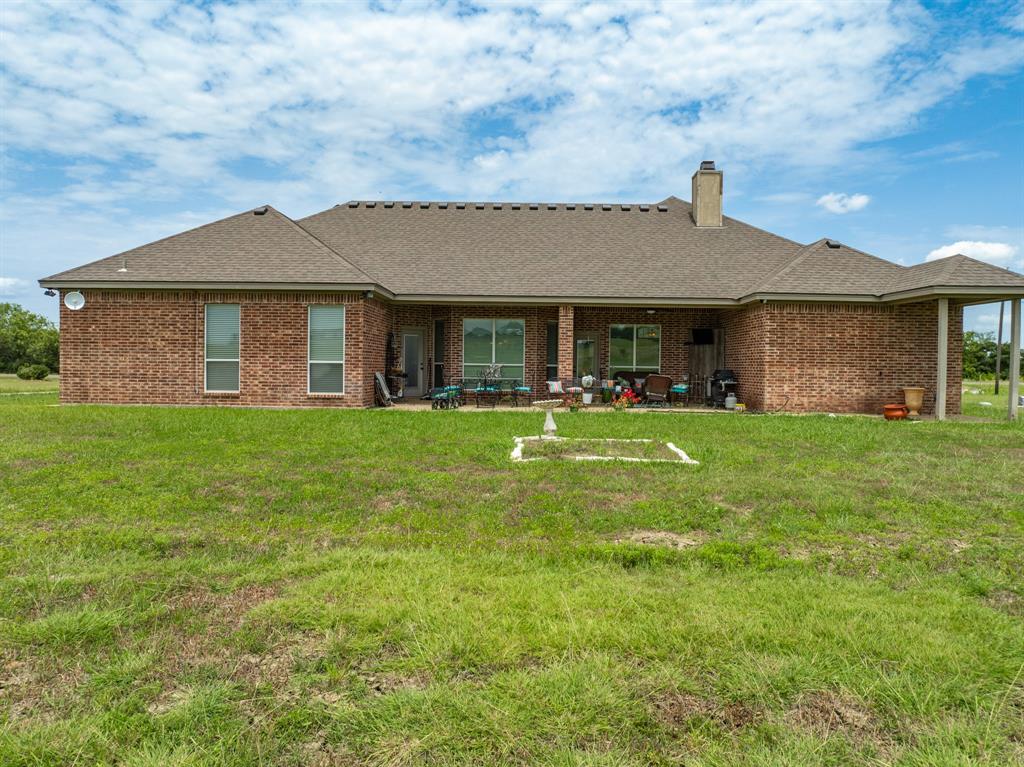 845 County Line Road West West, TX 76691 - Photo 25 of 38 a front view of house with yard