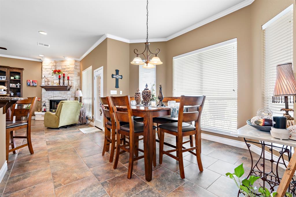 845 County Line Road West West, TX 76691 - Photo 10 of 38 a view of a dining room with furniture and chandelier