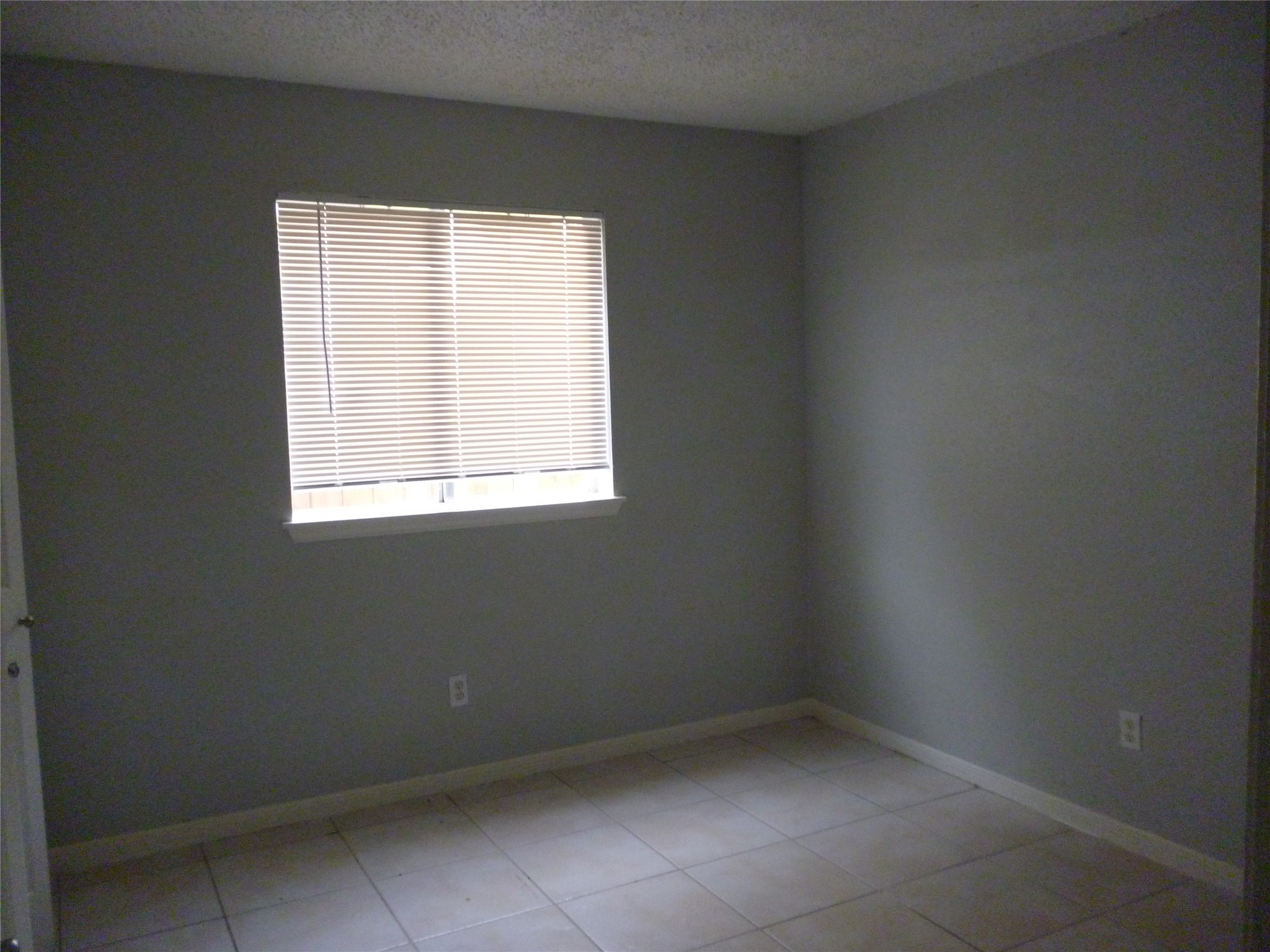 3243 Battle Ridge Lane Sugar Land, TX 77479 - Photo 17 of 34 an empty room with a window