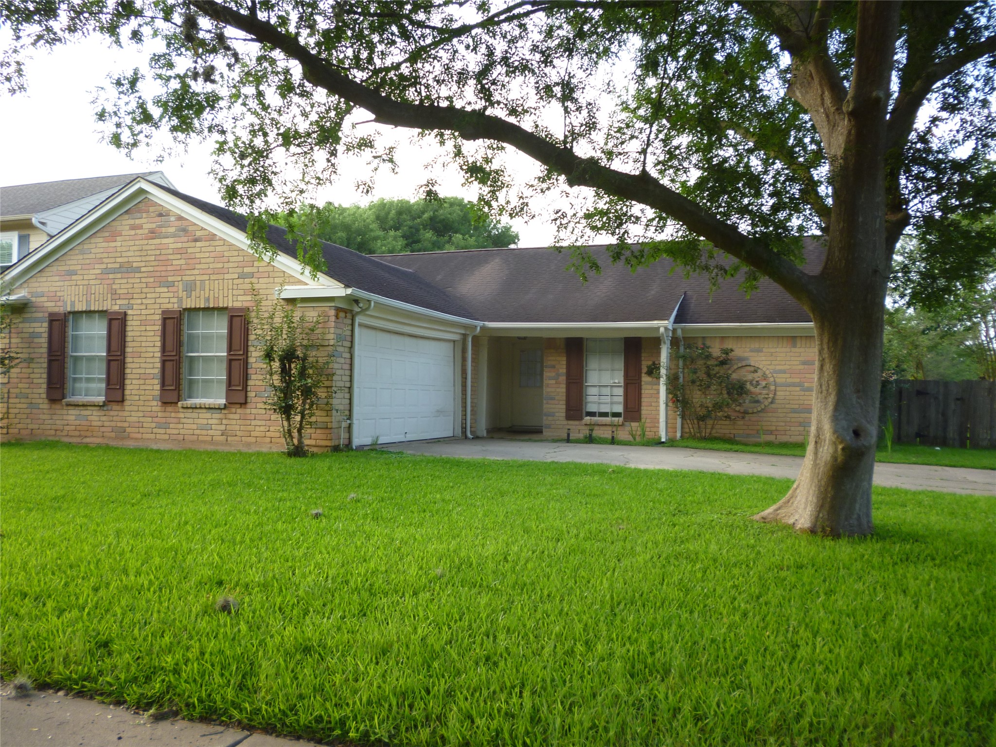3243 Battle Ridge Lane Sugar Land, TX 77479 - Photo 2 of 34 a view of a house with a yard and tree s