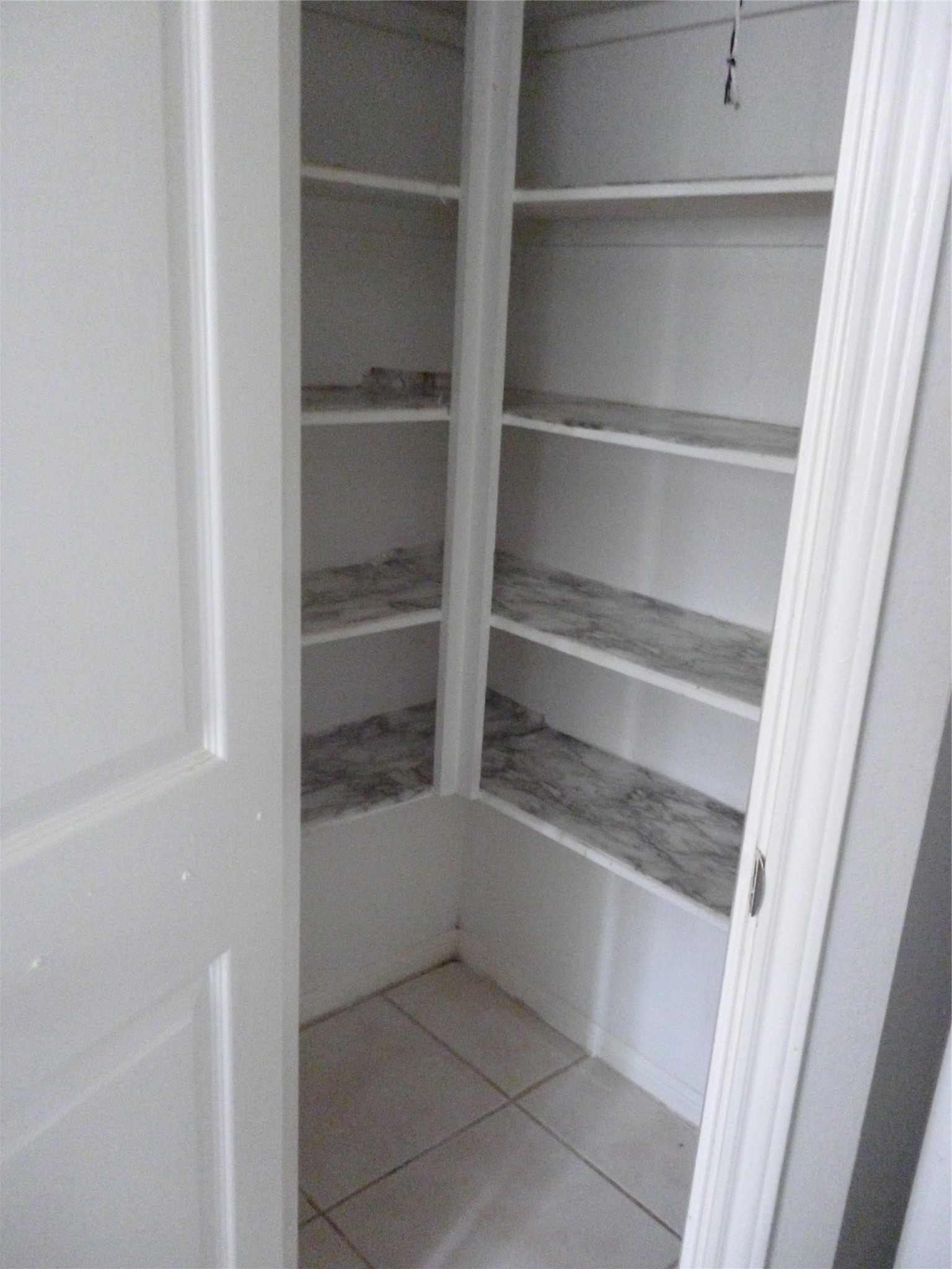 3243 Battle Ridge Lane Sugar Land, TX 77479 - Photo 25 of 34 a view of walk in closet with empty racks