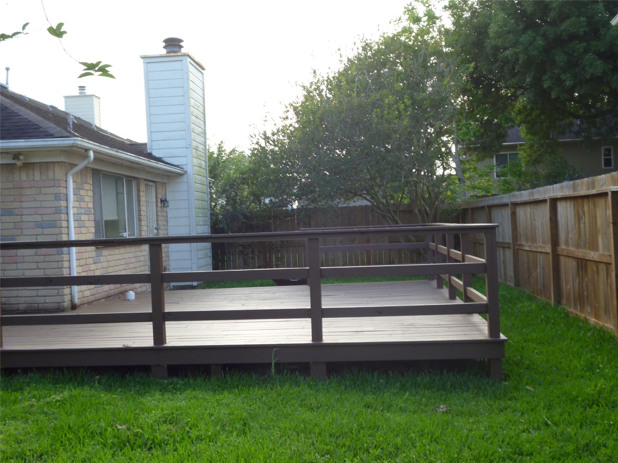 3243 Battle Ridge Lane Sugar Land, TX 77479 - Photo 27 of 34 a view of a backyard with a garden