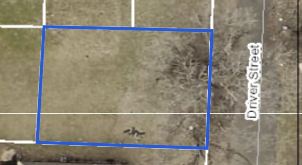 a bathroom with a shower and a mirror