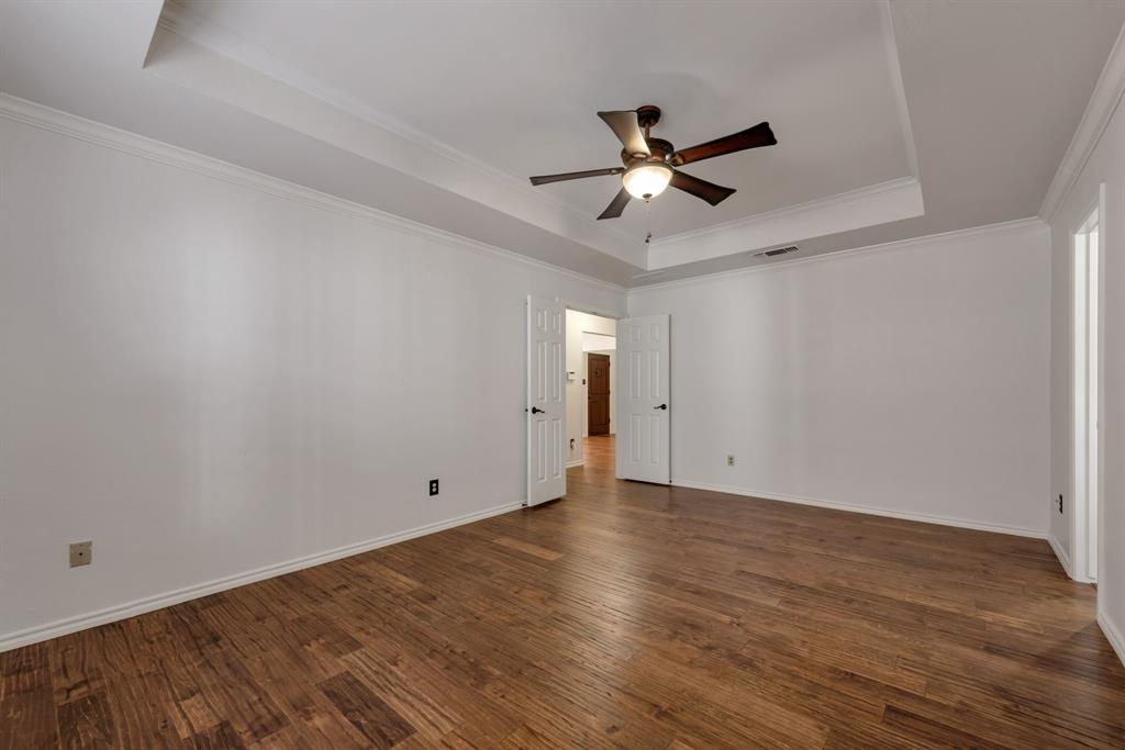 3305 Timber View Circle Bedford, TX 76021 - Photo 24 of 26 a view of an empty room with wooden floor