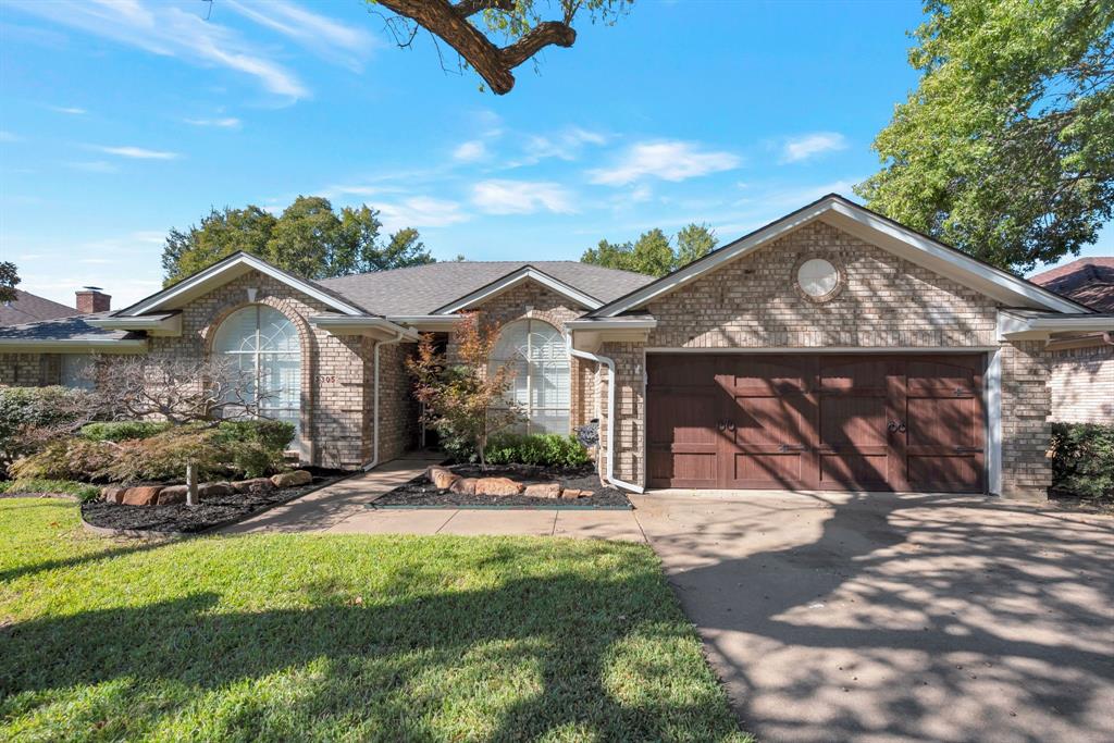 3305 Timber View Circle Bedford, TX 76021 - Photo 3 of 26 a view of a house with yard and sitting area