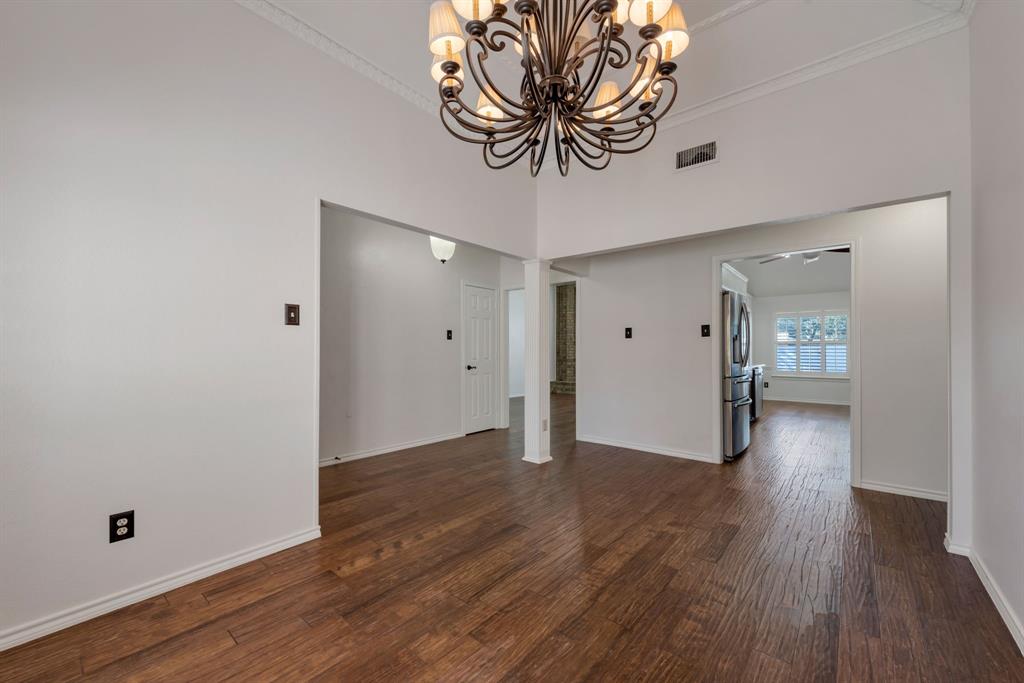3305 Timber View Circle Bedford, TX 76021 - Photo 9 of 26 a view of a hallway with wooden floor