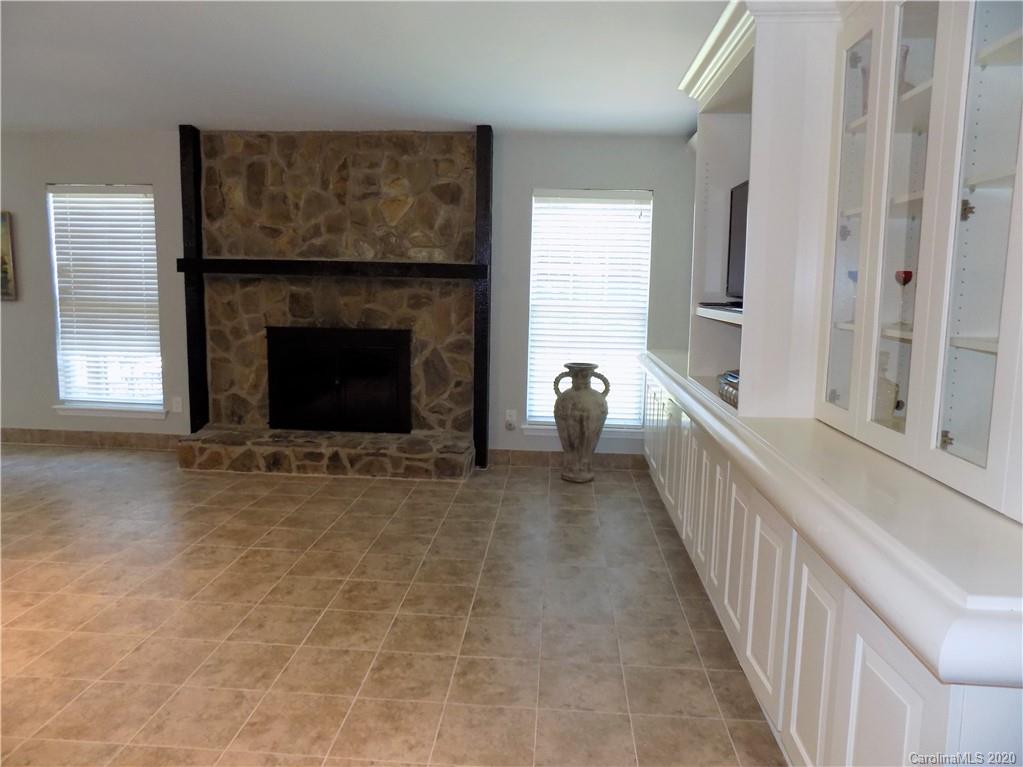 10117 Fairway Ridge Road Charlotte, NC 28277 - Photo 4 of 29 a view of a livingroom with a fireplace