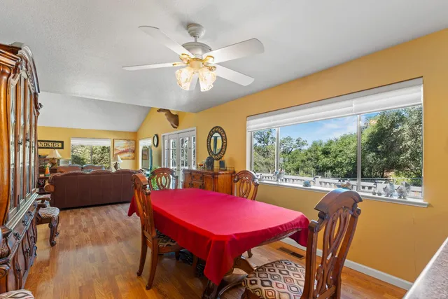 a living room with furniture fireplace and a flat screen tv