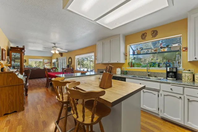 a bedroom that has a bed and a table in it