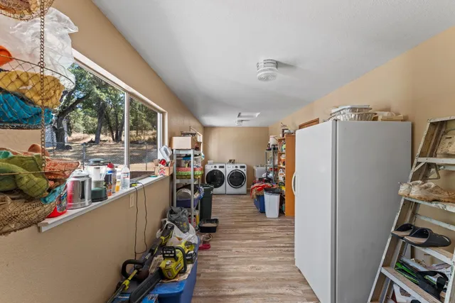 a bed room with a bed and a chandelier