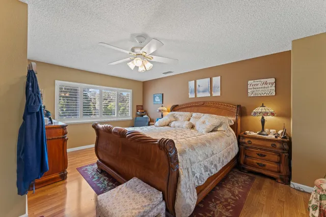 a view of a balcony with wooden floor