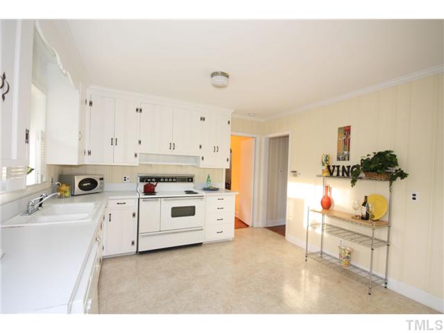 705 Brighton Road Durham, NC 27707 - Photo 19 of 24 Another view of the kitchen. Feel the need to make it even nicer? Imagine this kitchen with granite counters and a butcher block island. Someday.