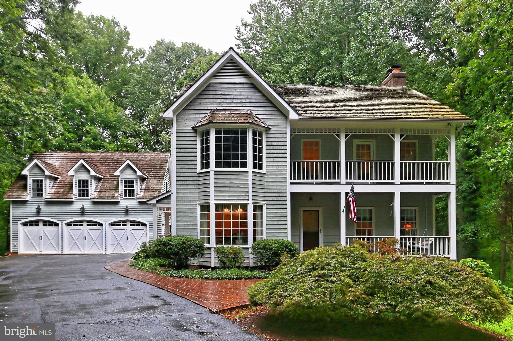 6729 Surbiton Drive Clifton, VA 20124 - Photo 2 of 25 a front view of a house with a yard