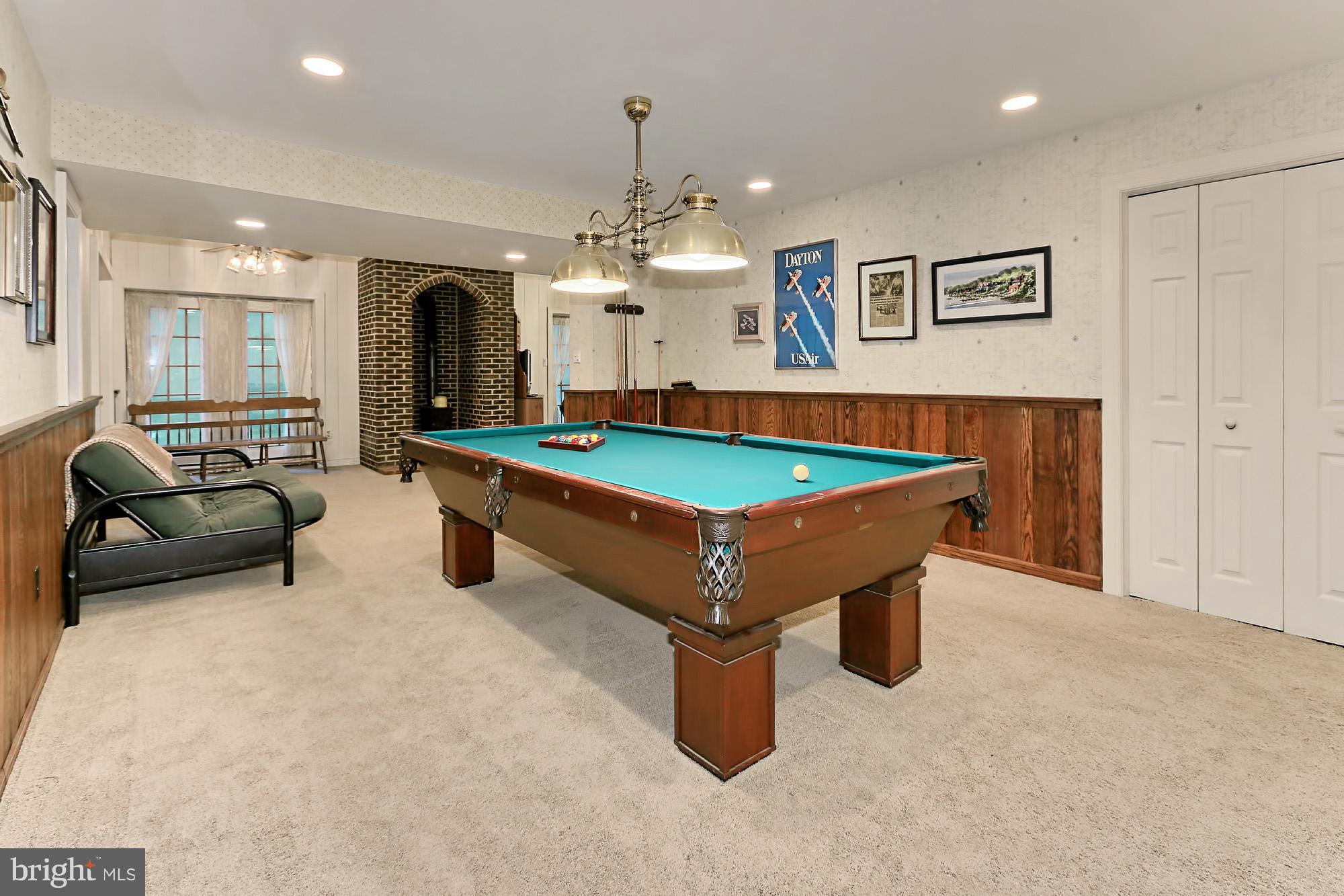 6729 Surbiton Drive Clifton, VA 20124 - Photo 23 of 25 a room with pool table and windows