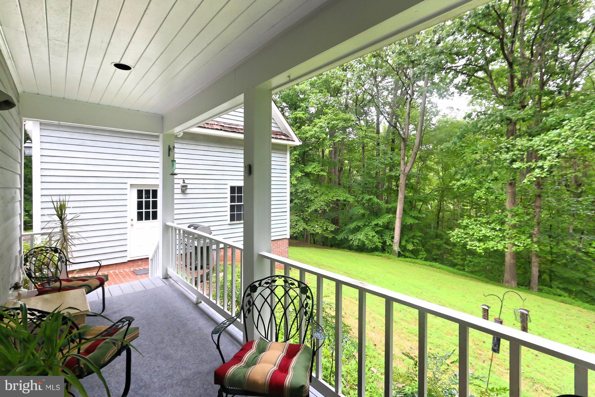 6729 Surbiton Drive Clifton, VA 20124 - Photo 25 of 25 a view of a porch with furniture