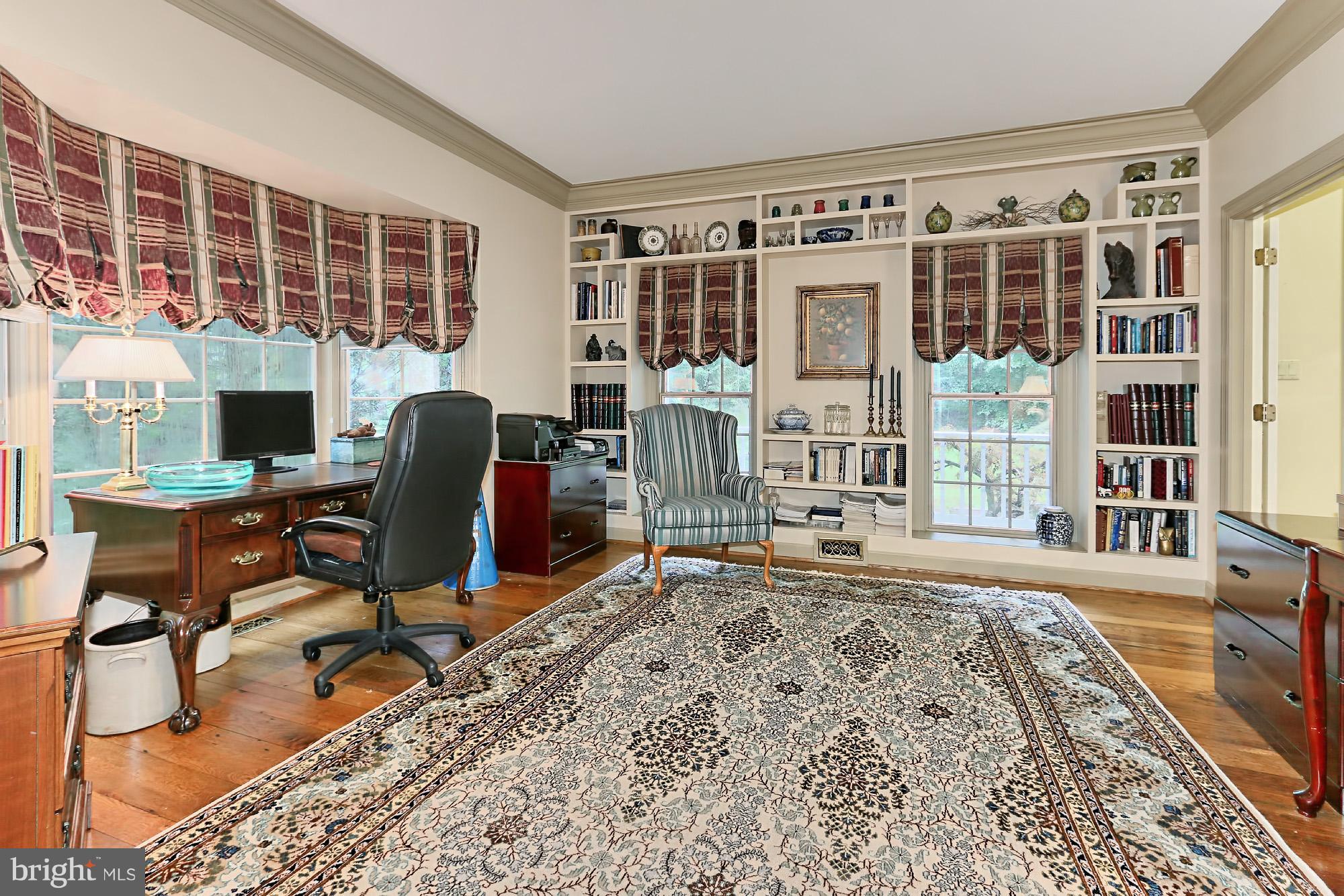 6729 Surbiton Drive Clifton, VA 20124 - Photo 6 of 25 a view of a workspace with furniture and a window