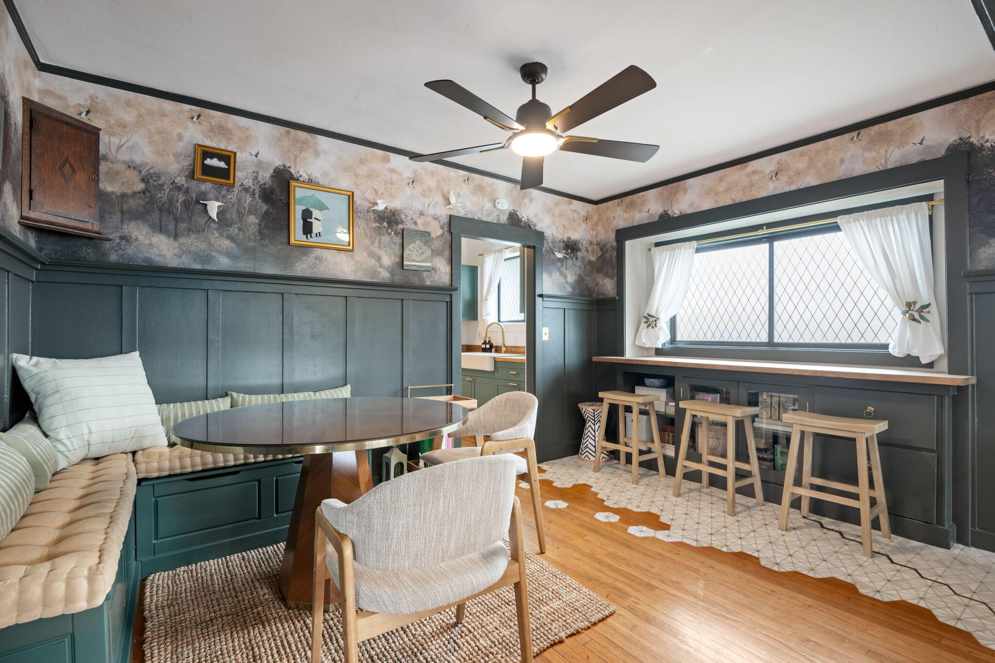 802 Olive Street Santa Barbara, CA 93101 - Photo 11 of 26 a living room with furniture a fireplace and a large window