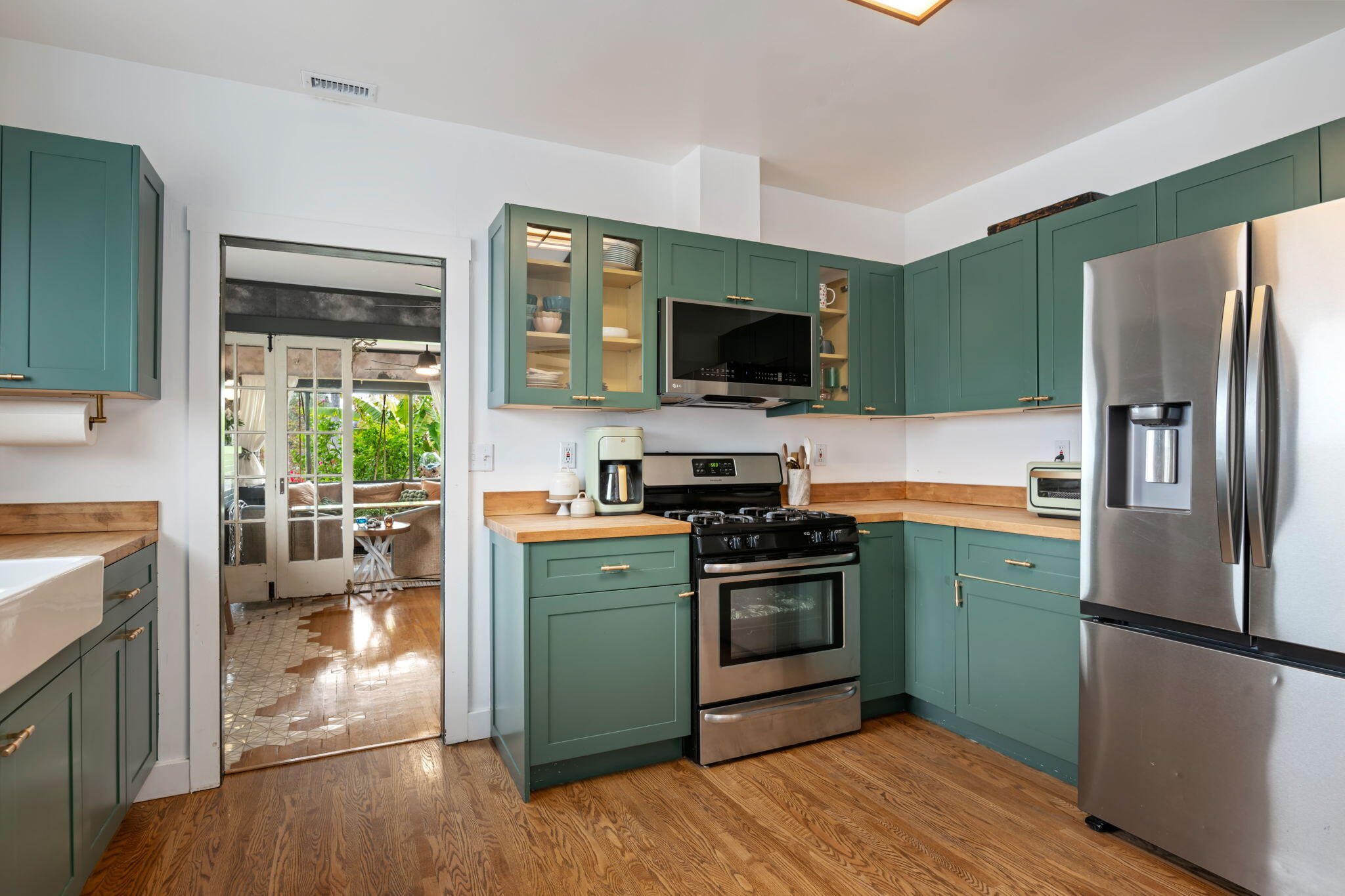 802 Olive Street Santa Barbara, CA 93101 - Photo 14 of 26 a kitchen with a refrigerator stove and sink