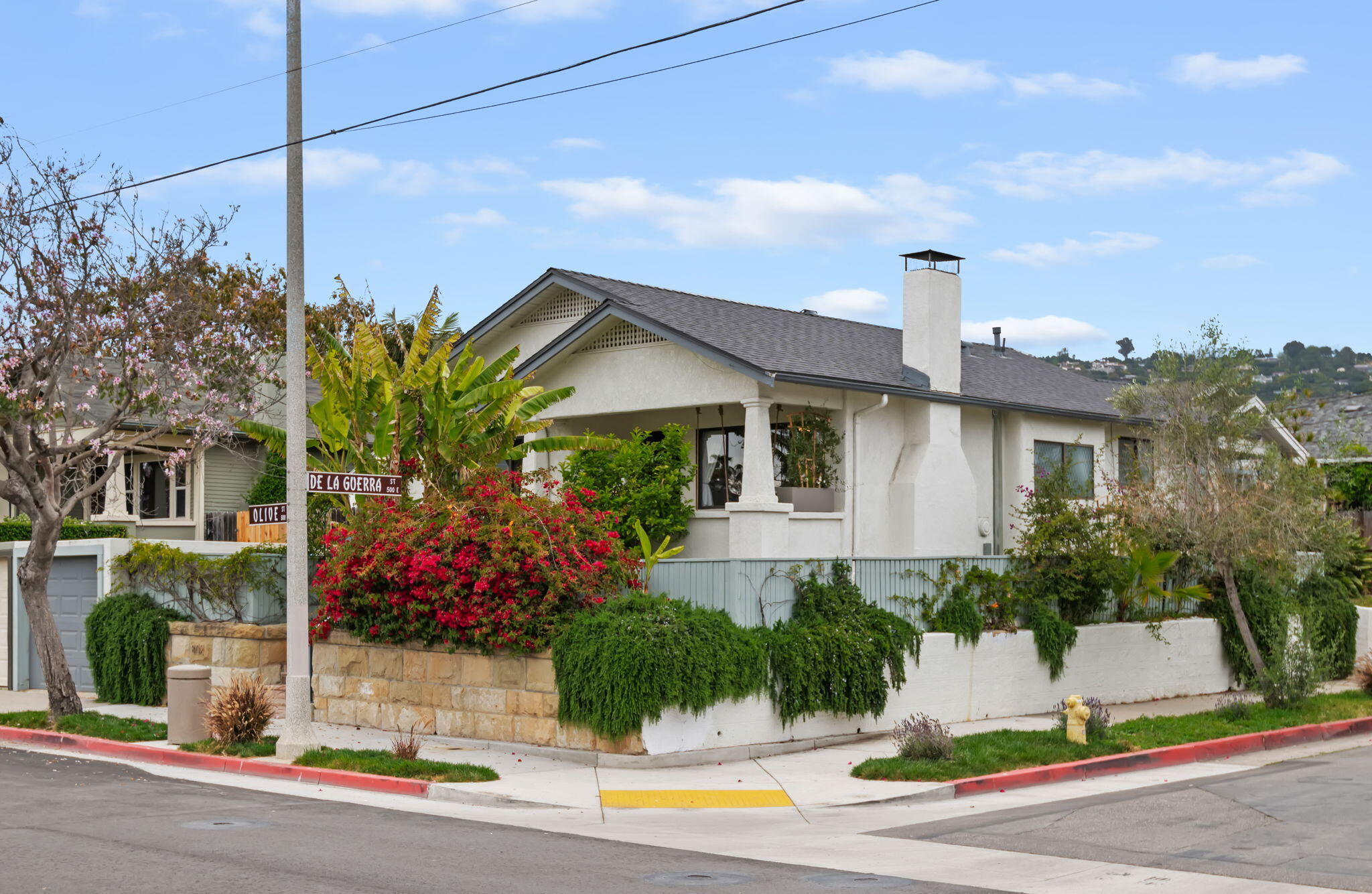802 Olive Street Santa Barbara, CA 93101 - Photo 2 of 26 a front view of a house with garden