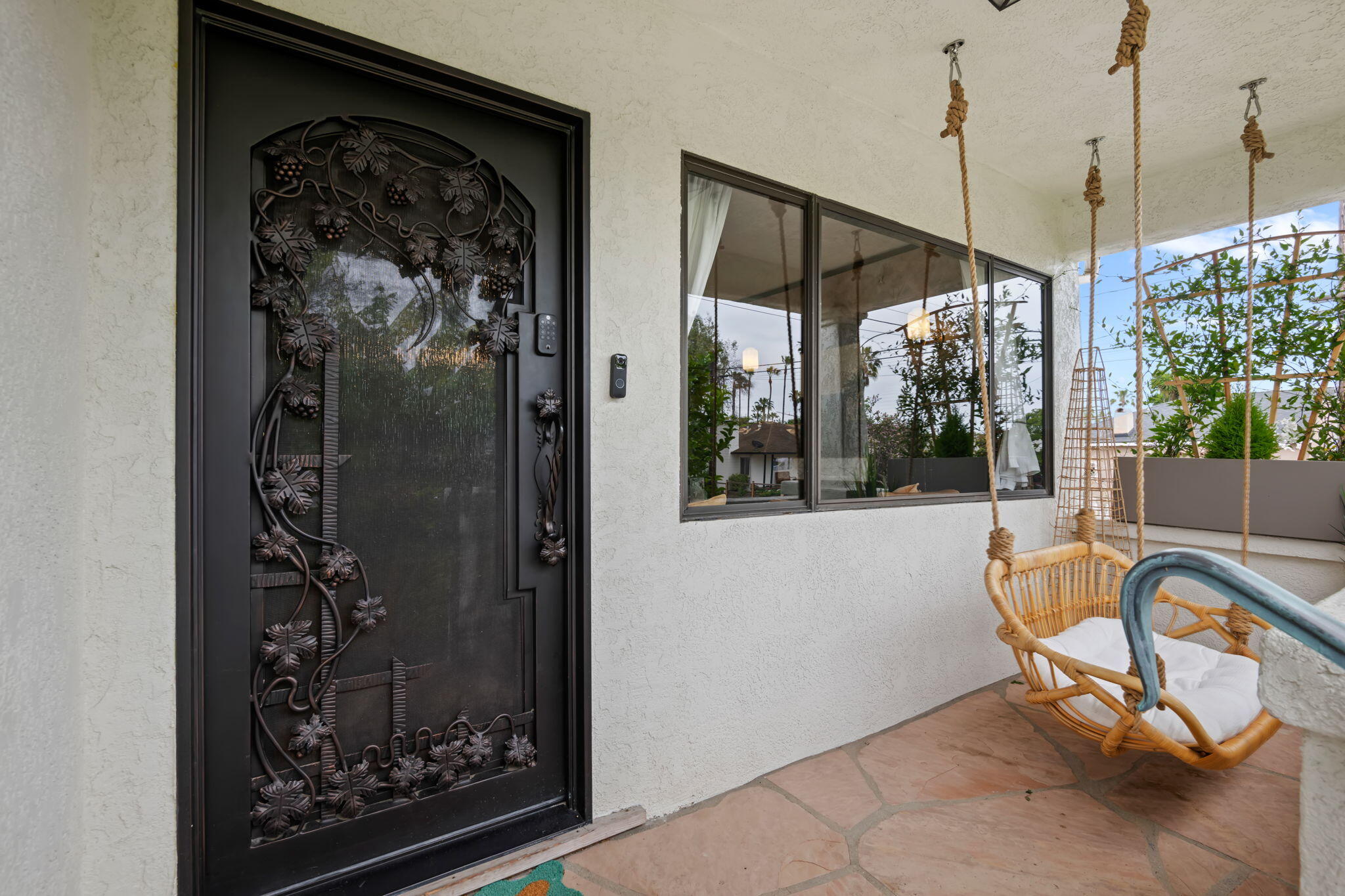 802 Olive Street Santa Barbara, CA 93101 - Photo 7 of 26 a view of a hallway with furniture and front door