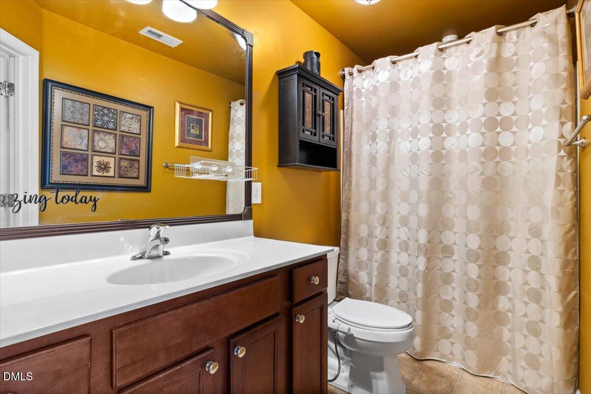 8557 Quarton Drive Raleigh, NC 27616 - Photo 13 of 20 OWNER'S SUITE BATH