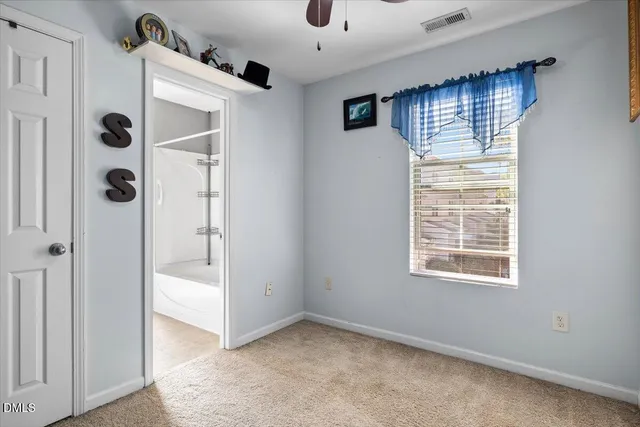 a view of a hallway with front door