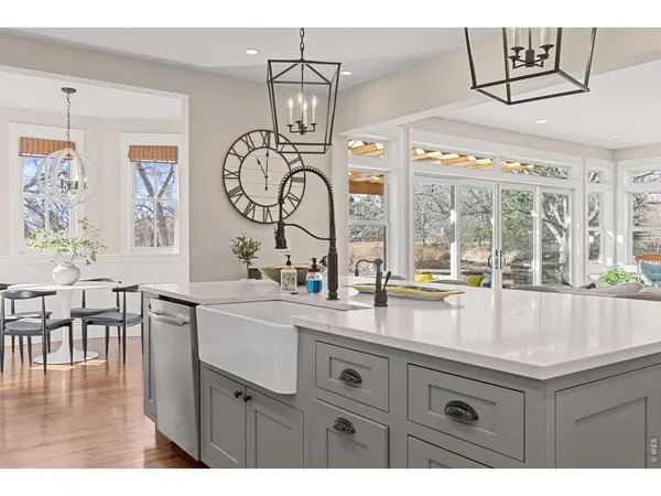a kitchen with sink and window