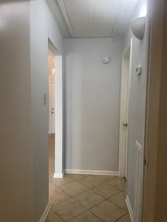 a view of entryway with bathroom