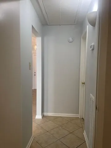 a view of entryway with bathroom